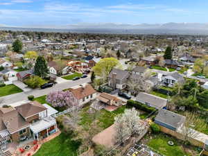 Drone / aerial view with a residential view and a mountain view
