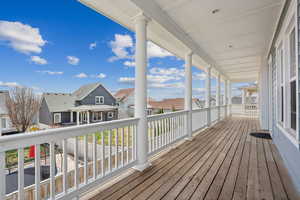 Wooden deck featuring a residential view
