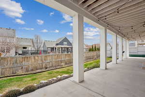 View of patio / terrace with fence and a residential view