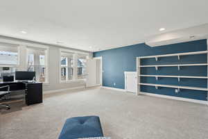 Home office with baseboards, recessed lighting, and carpet flooring
