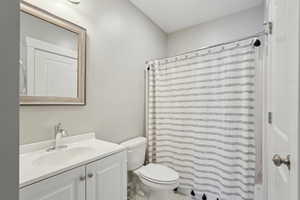 Bathroom with toilet and vanity