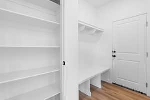 Mudroom with wood finished floors