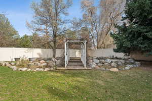 View of yard with a fenced backyard