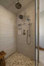 Full bath with tiled shower