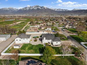 Birds eye view of property featuring a mountain view and a residential view