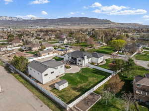 Aerial view featuring a mountain view and a residential view