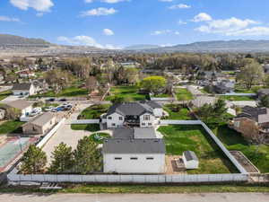 Drone / aerial view featuring a mountain view and a residential view