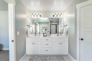 Primary bathroom attached to primary bedroom