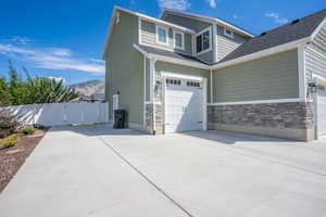 3rd Car Garage and RV Parking pad.Exterior Photos taken from previous season