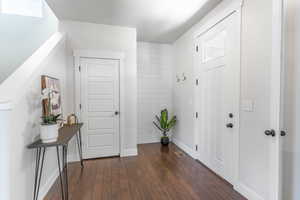 Entry featuring a coat closet.