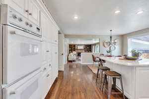 Classic white kitchen with double wall ovens