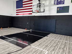 View of basketball court featuring basketball hoop