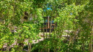 View of play area with a wooden deck