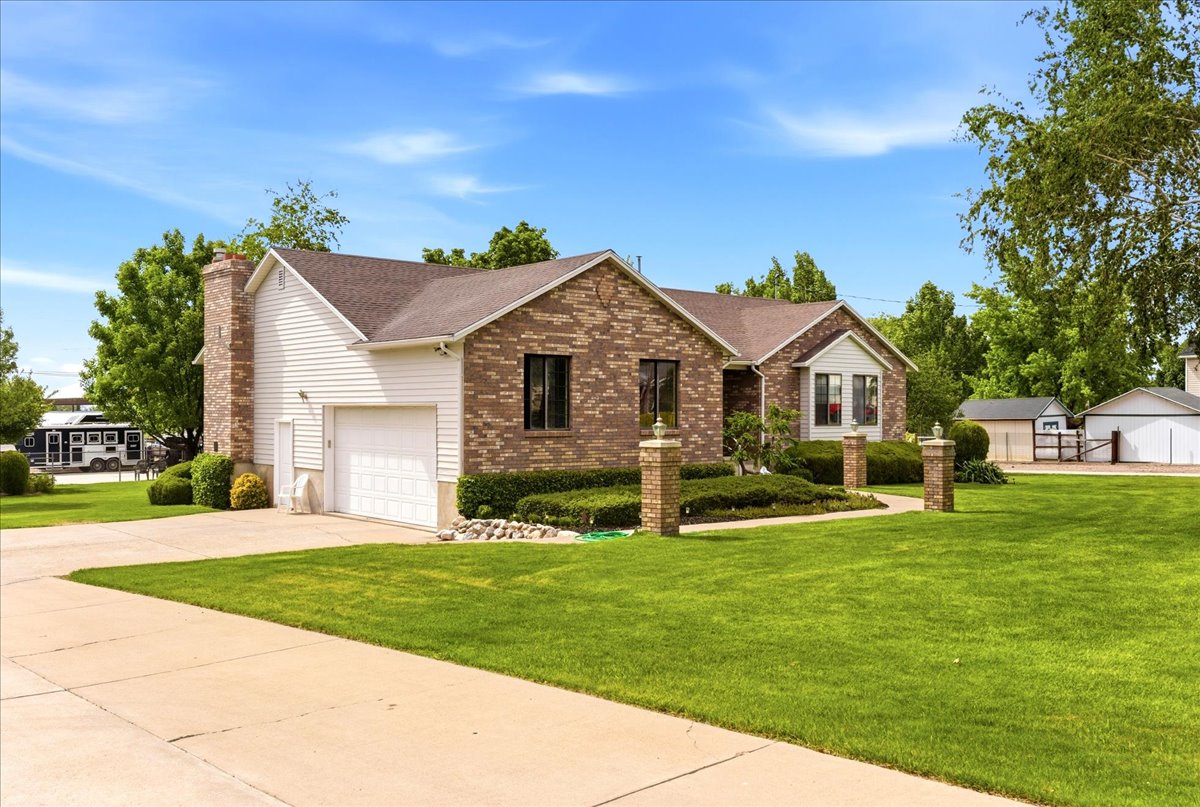 Brick and siding exterior with a pitched roof