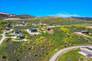 Drone / aerial view featuring a mountain view and a residential view