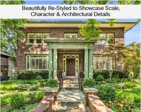 Entrance to property featuring brick siding