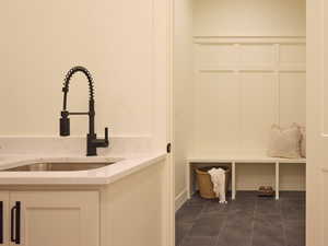 Mudroom featuring a sink