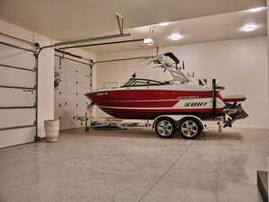 Garage featuring a garage door opener