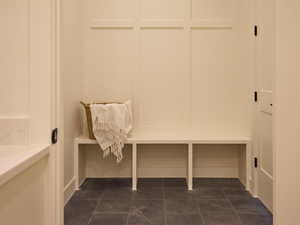Mudroom featuring marble finish floor