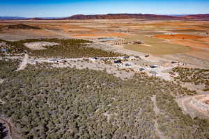 Aerial view featuring a mountain view and view of desert