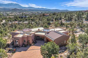 Birds eye view of property featuring a mountain view