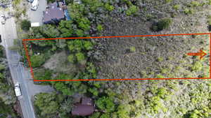 Aerial overview of property's location featuring property boundaries highlighted
