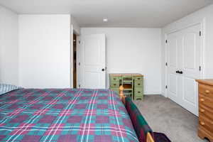 Unfurnished bedroom with carpet floors