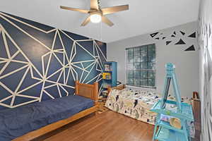 Bedroom featuring wood finished floors