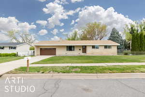 Ranch-style house featuring brick siding, fence, a front yard, concrete driveway, and an attached garage