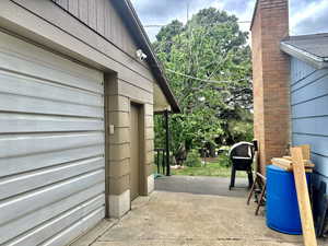 View of property exterior with a patio