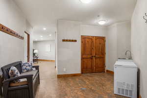 Dedicated sports, gear, mud room with sink can easily be converted to ADU or kitchen area.  **Subj to HOA & City regulations