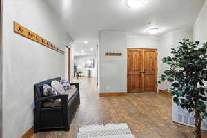 Foyer featuring baseboards