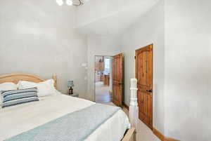 Bedroom featuring baseboards