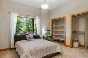 Bedroom with good closet space, natural light and newer carpet.
