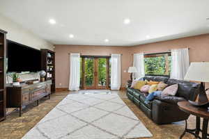 Living room featuring recessed lighting and baseboards
