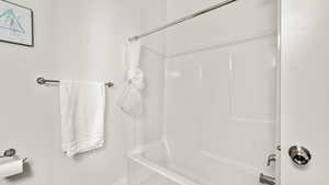 Full bathroom featuring shower / bath combination