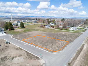 Drone / aerial view with a mountain view and a residential view