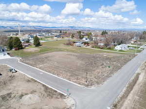Drone / aerial view featuring a residential view and a mountain view