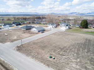 Drone / aerial view featuring a residential view and a mountain view
