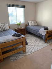 Bedroom featuring carpet