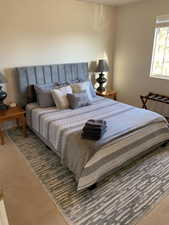 Bedroom featuring carpet