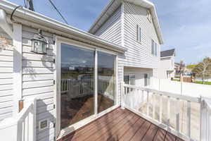 View of wooden deck. sliding glass door of the dining area