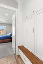 Mudroom featuring light wood-style floors, baseboards, visible vents, and recessed lighting