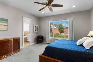 Bedroom with connected bathroom, visible vents, recessed lighting, light carpet, and baseboards