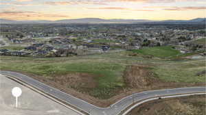 Aerial view at dusk with a mountain view and a residential view
