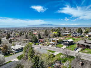 Aerial view featuring a mountain view and a residential view