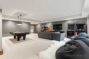 Rec room featuring recessed lighting, a raised ceiling, billiards table, and light colored carpet