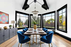 Dining area with light wood finished floors, a chandelier, plenty of natural light, a high ceiling, and beamed ceiling