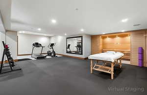Exercise area with baseboards and recessed lighting