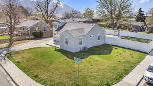 Birds eye view of property with a residential view and a mountain view